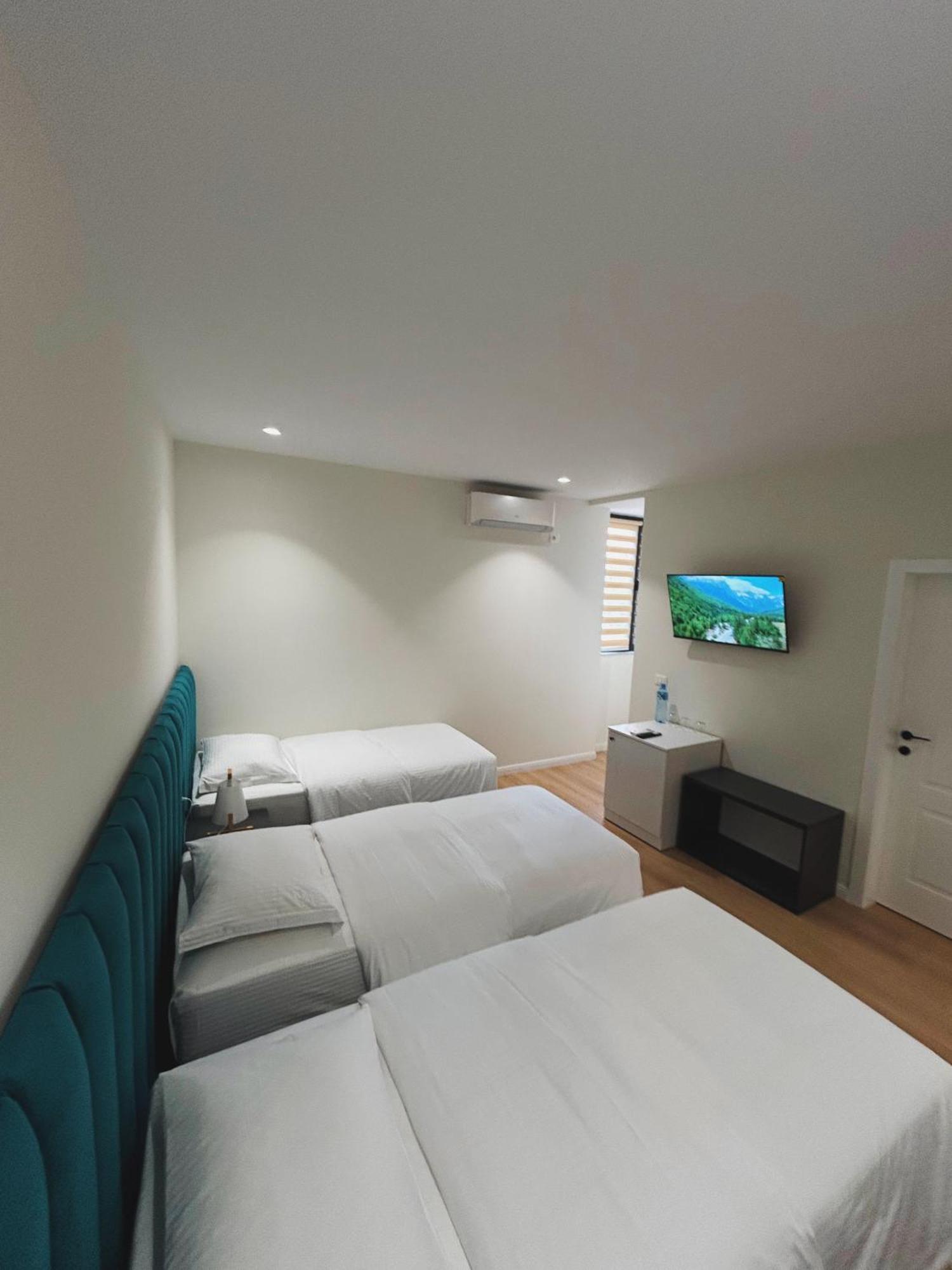 Clinton Tirana Inn Habitación foto